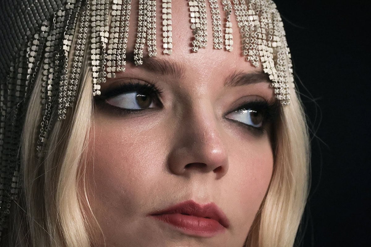Anya Taylor-Joy adds drama to her 1920s flapper look with smokey eyeshadow and pink lipstick