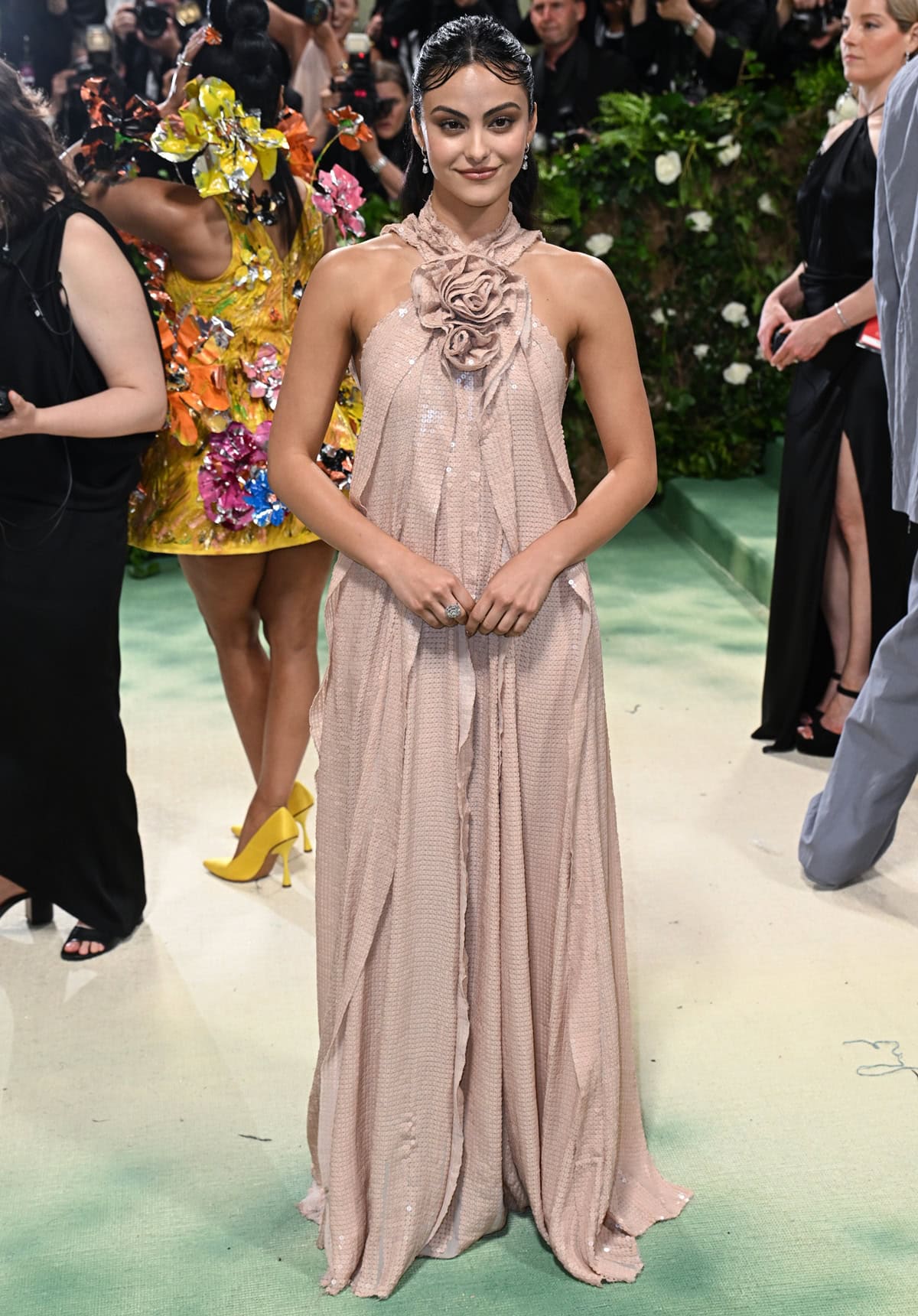 Ethereal beauty: Camila Mendes radiates goddess-like allure in a floral Altuzarra gown at the 2024 Met Gala