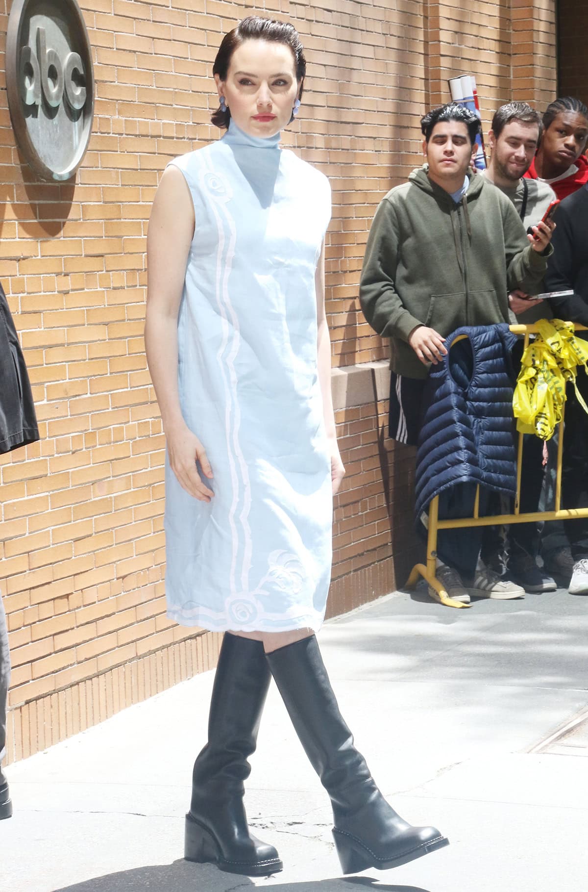 Daisy Ridley heads to the View studios to promote Young Woman and the Sea in a light blue Prada dress with a high neck and sea elements