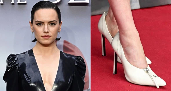 Daisy Ridley Looks Sleek in Navy Latex Dress and White Zipped Pumps at Young Woman and the Sea London Screening