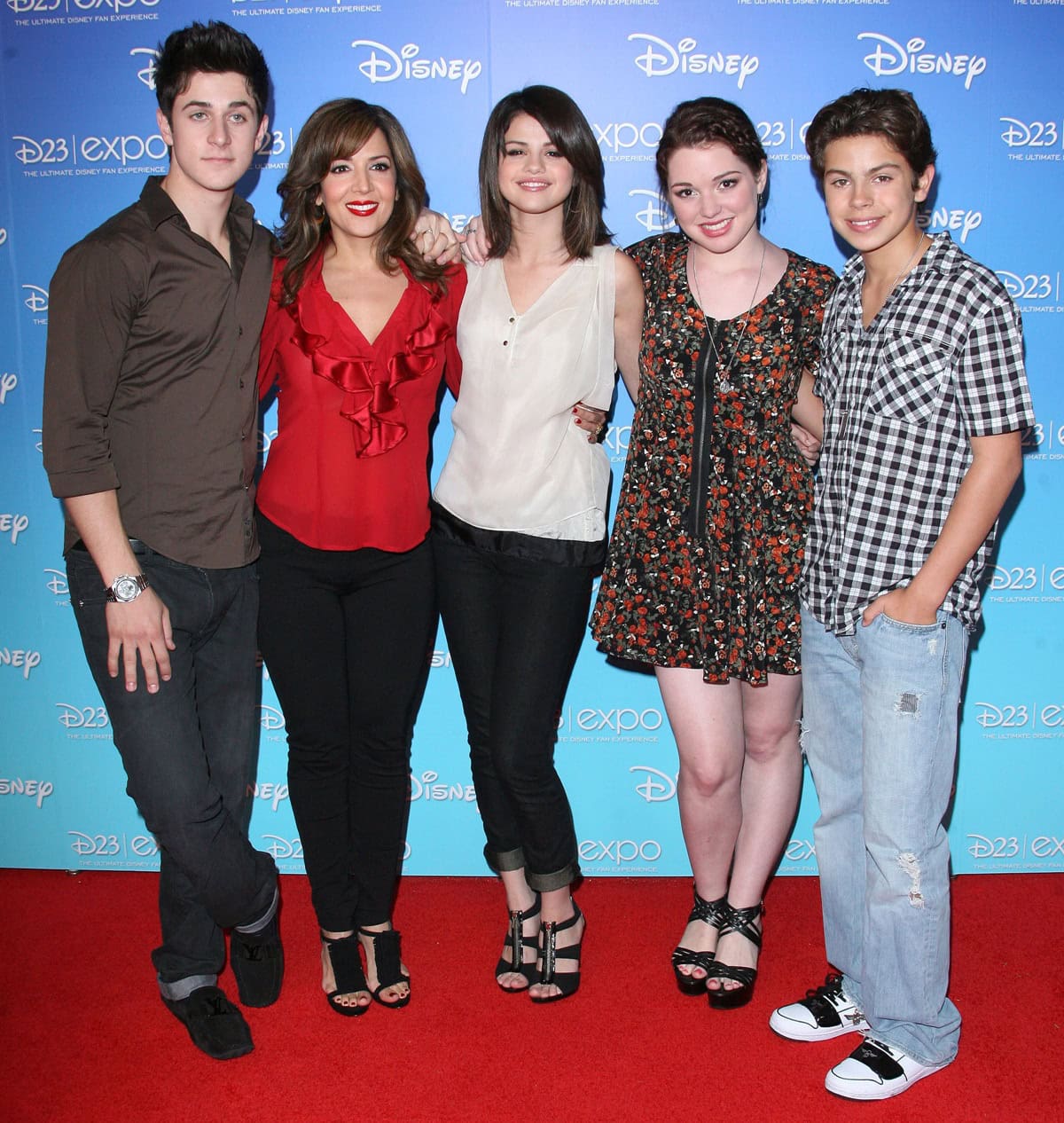 David Henrie, Maria Canals-Barrera, Selena Gomez, Jennifer Stone, and Jake T. Austin step out in stylish red carpet looks at the D23 Expo in Anaheim on September 13, 2009, with the women in chic heels and the men in sleek casual shoes