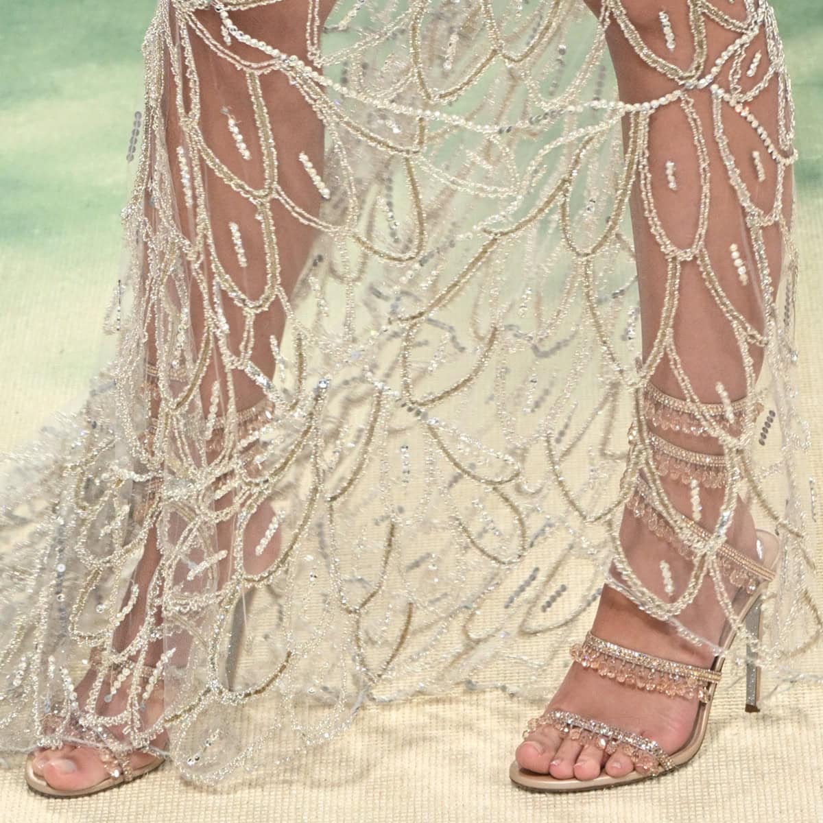 Emily Ratajkowski complements her striking gown with René Caovilla Chandelier stiletto sandals