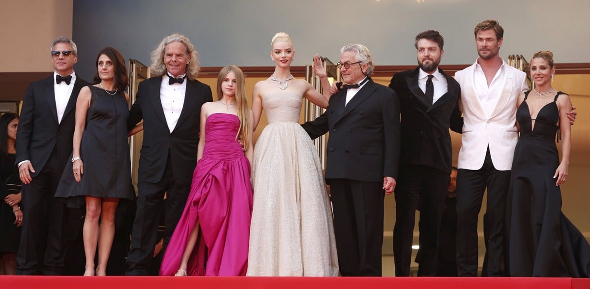 Michael DeLuca, Pamela Abdy, Doug Mitchell, Alyla Browne, Anya Taylor-Joy, George Miller, Tom Burke, Chris Hemsworth, and Elsa Pataky attend the "Furiosa: A Mad Max Saga" (Furiosa: Une Saga Mad Max) Red Carpet at the 77th annual Cannes Film Festival at Palais des Festivals on May 15, 2024 in Cannes, France