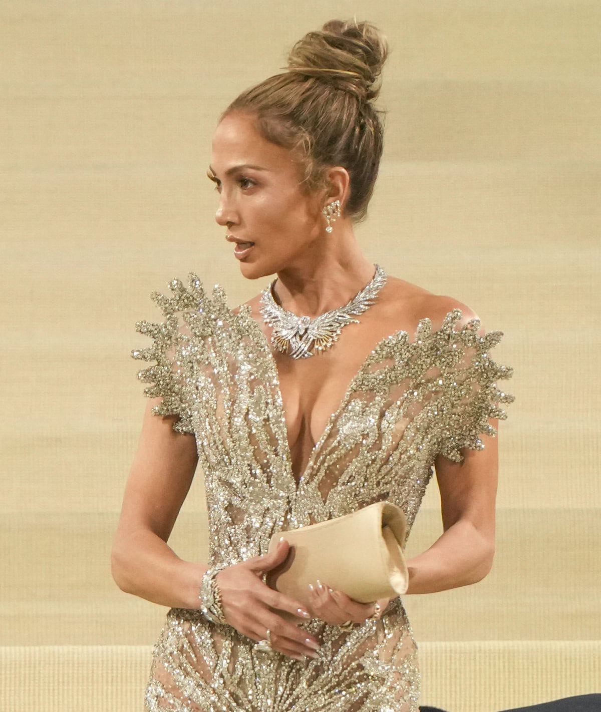 Jennifer Lopez gives her glittering gown some extra sparkles with exquisite jewelry from Tiffany & Co.'s newly launched Blue Book Tiffany Celeste collection