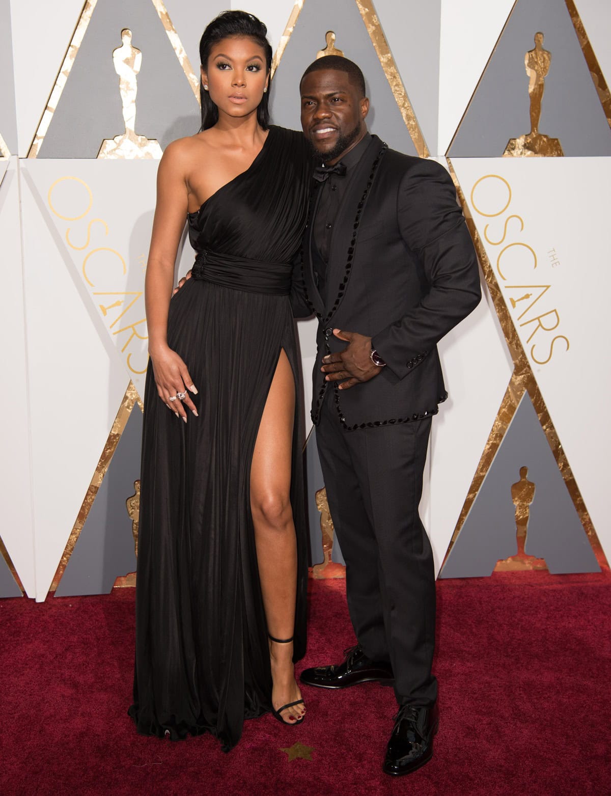 Kevin Hart and Eniko Parrish exude red-carpet sophistication at the 88th Annual Academy Awards in Hollywood, California, on February 28, 2016