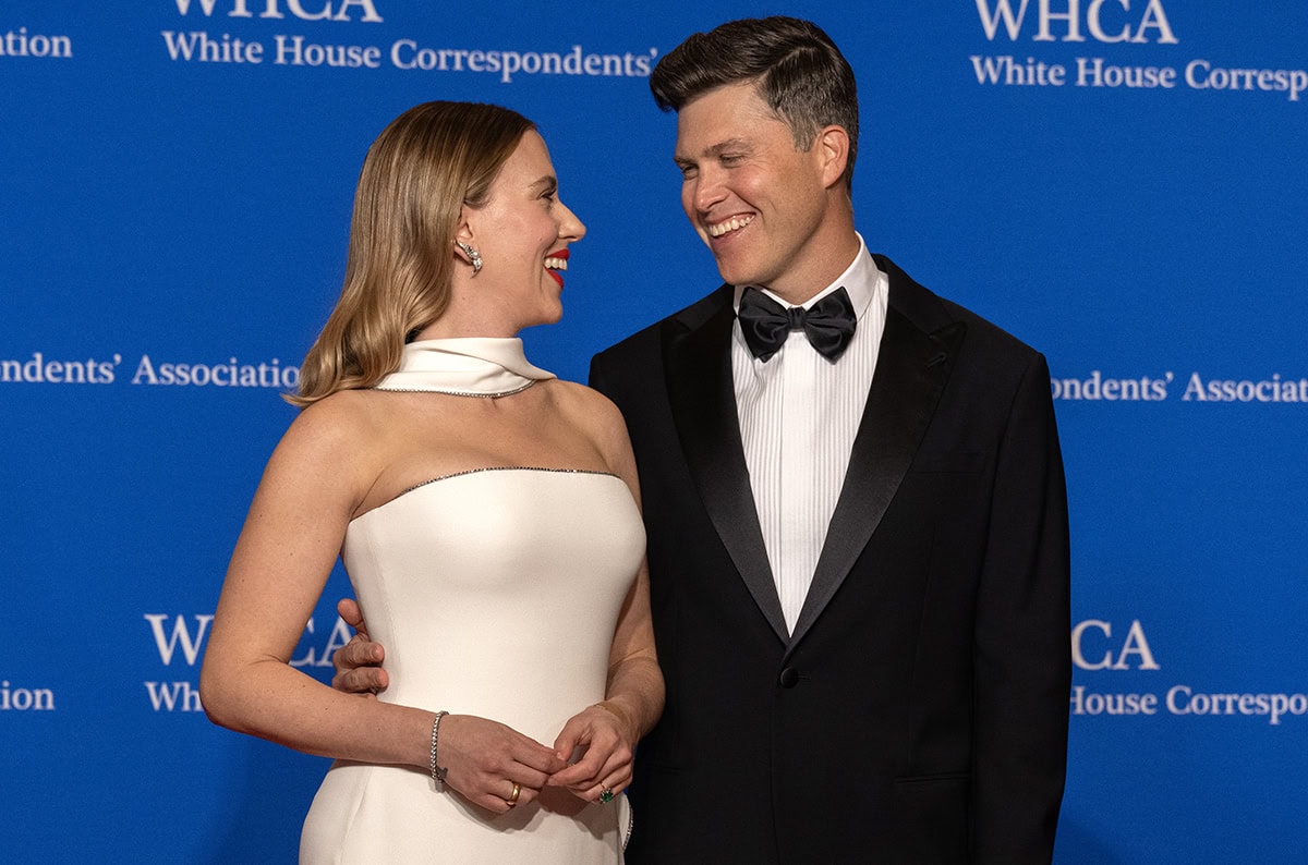 Comedian Colin Jost staring at his actress wife Scarlett Johansson on the red carpet before his hosting duties at the 2024 White House Correspondents Dinner