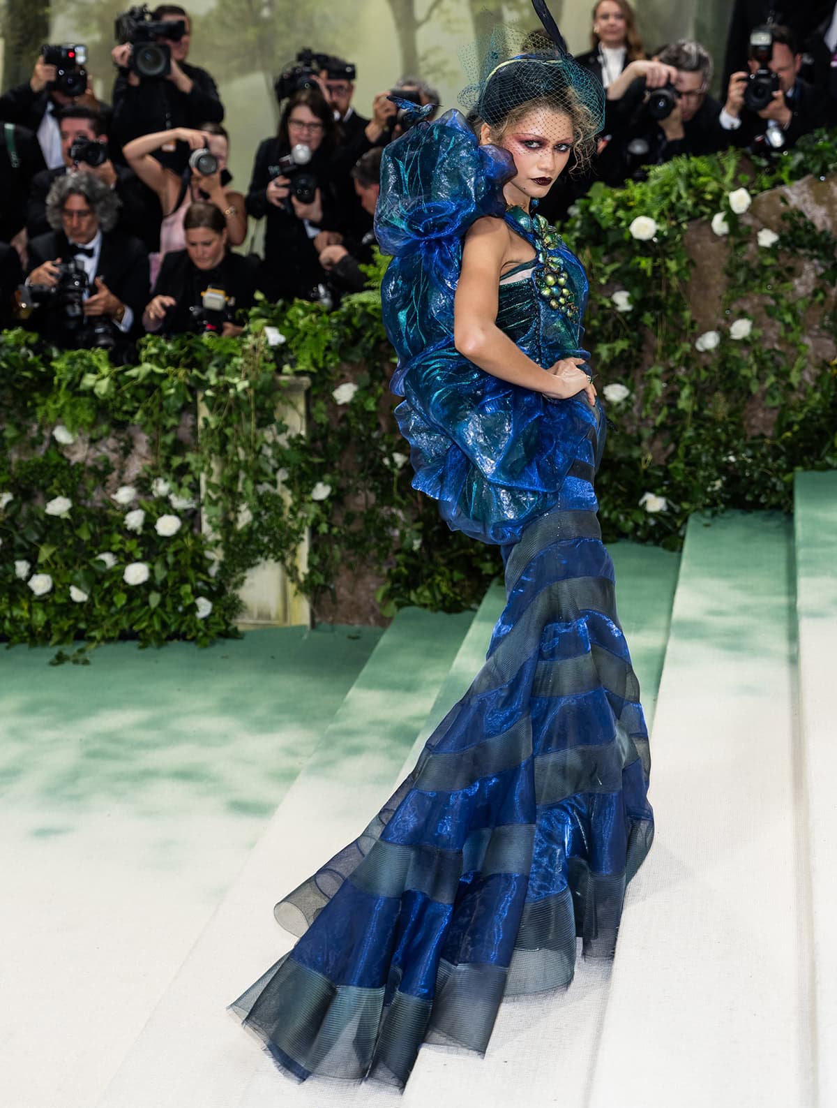Zendaya shows off her red-carpet skill, looking villainous as she strikes fierce poses on the Met Gala steps