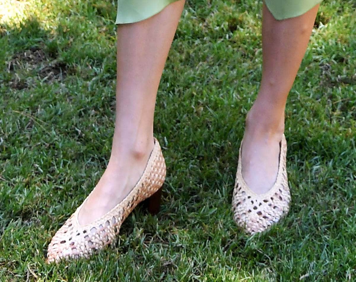 Brie Larson pairs her summery green dress with woven raffia pointed-toe pumps