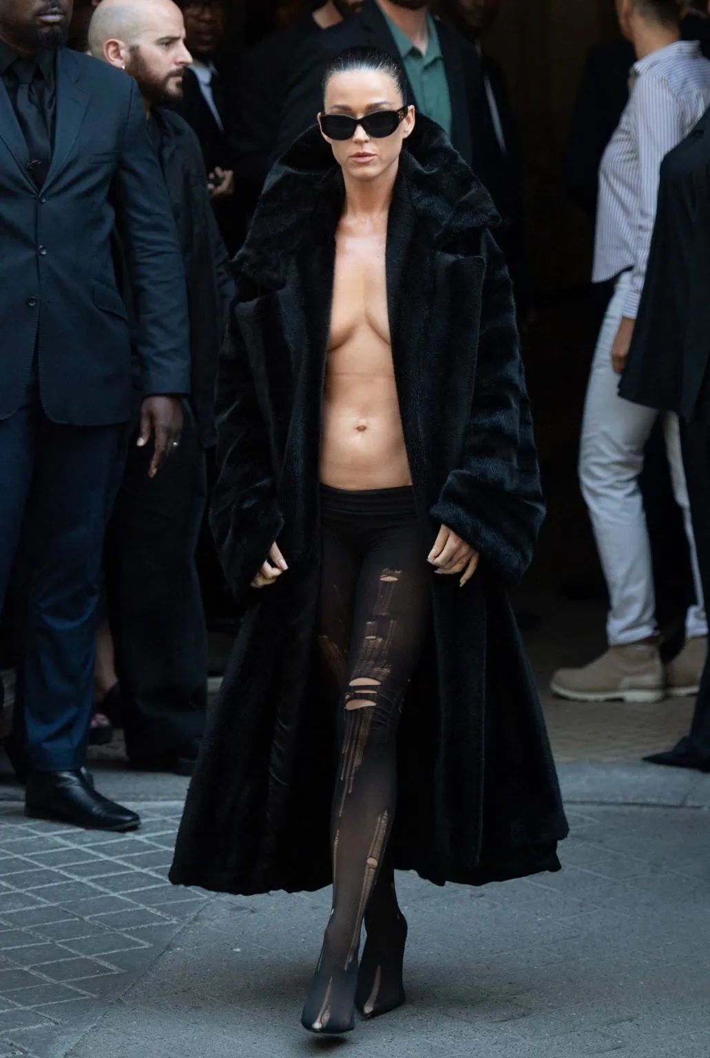 Bold and Bare: Katy Perry Rocks Dramatic Topless Look in Long Fur Coat and Ripped Tights at Balenciaga Haute Couture Show During Paris Fashion Week