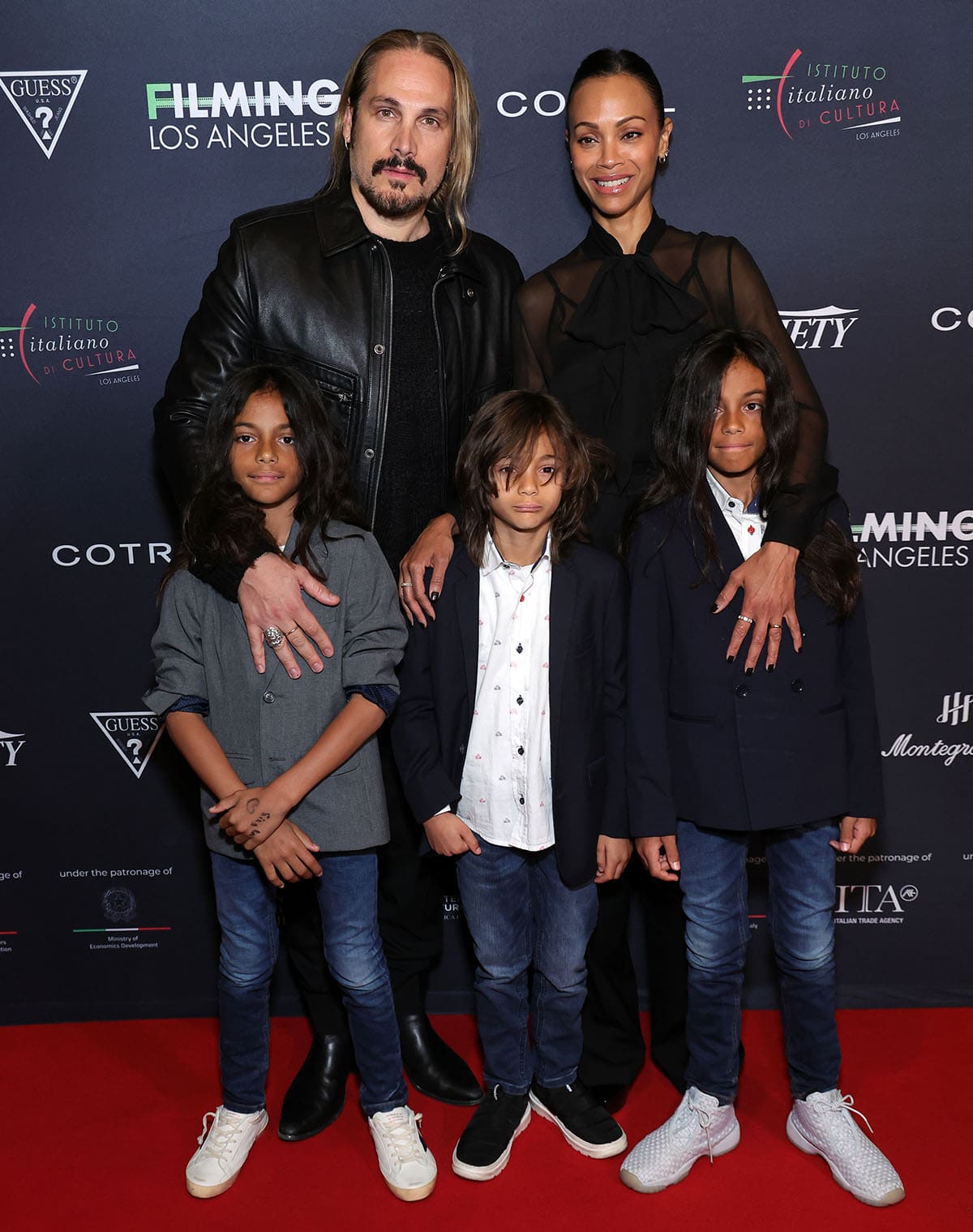 Marco Perego and Zoe Saldaña with their kids Bowie Ezio, Cy Aridio, and Zen Perego-Saldana at the 10th Annual Filming Italy Los Angeles Festival opening ceremony at the Directors Guild Of America