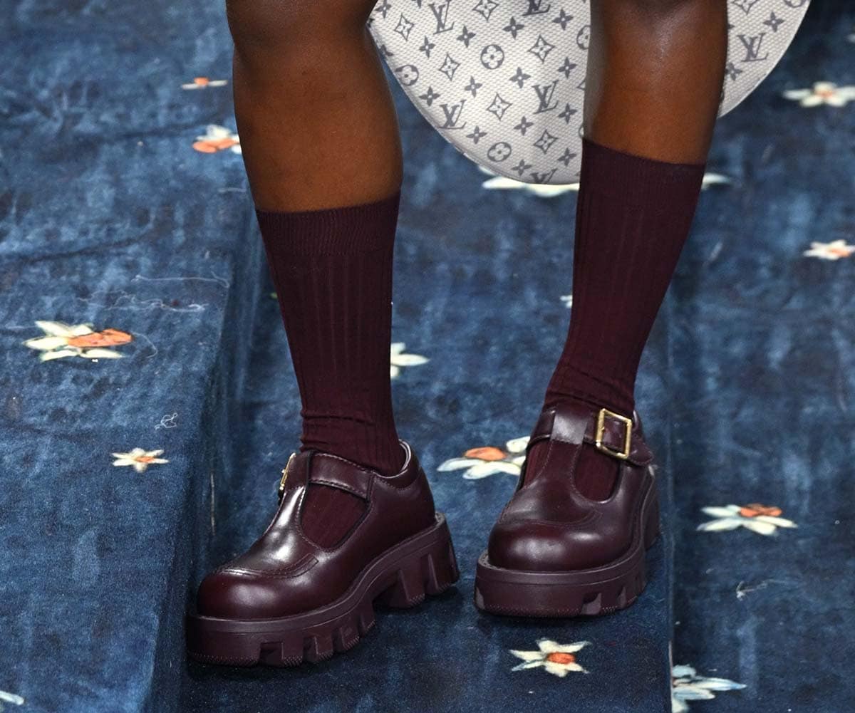 Doechii keeps things comfy with burgundy Mary Jane shoes with chunky lug soles by Louis Vuitton