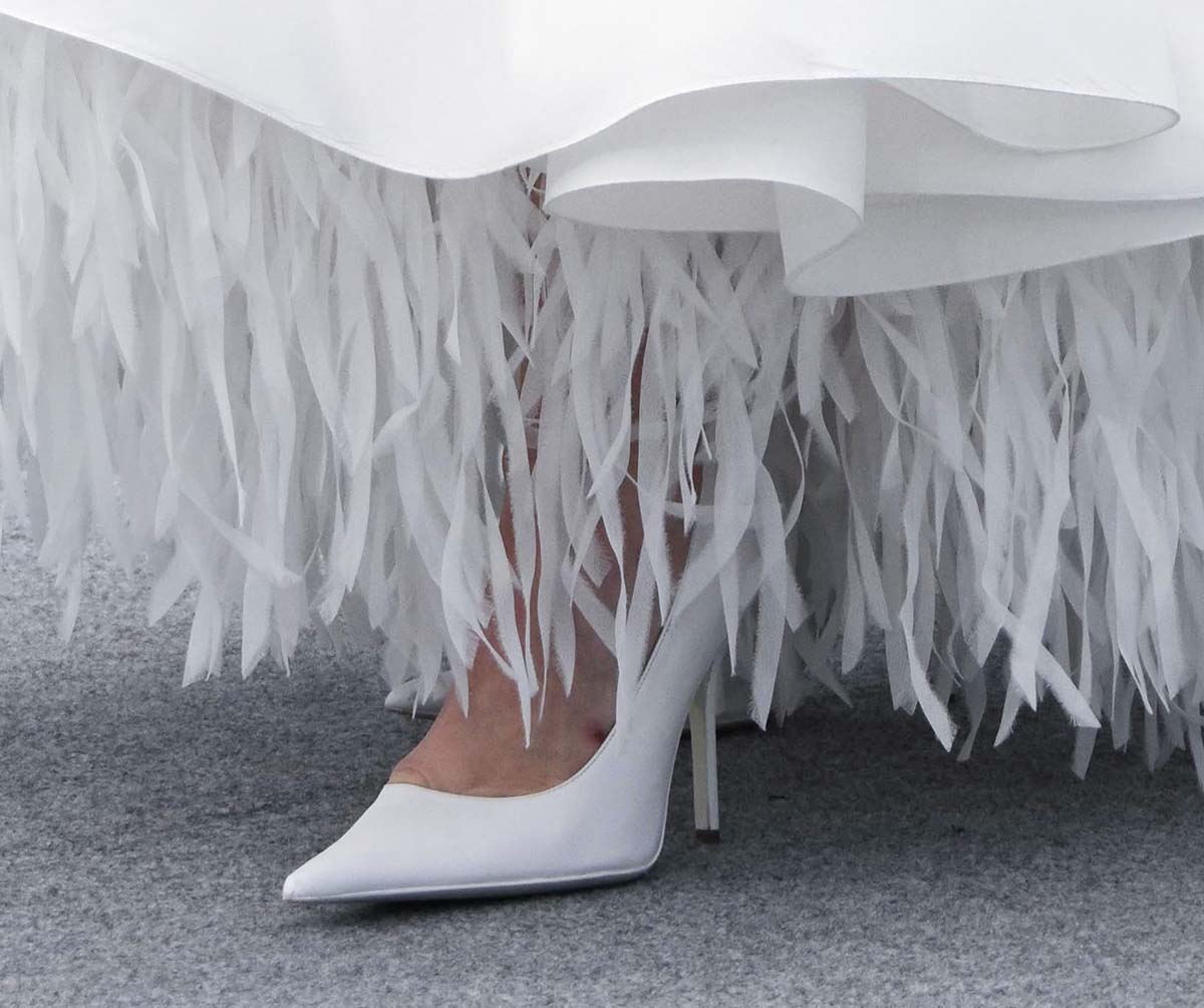 Hayley Atwell teams her white ensemble with white Gia Borghini pointed-toe pumps