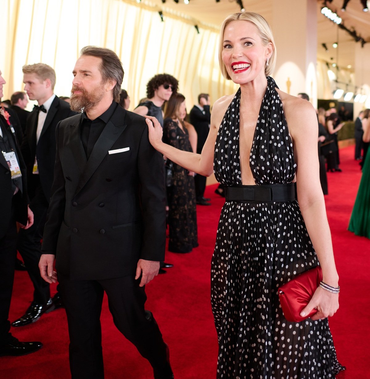 Leslie Bibb, standing at 5ft 8 ½ (174 cm) and wearing heels, towers over her 5ft 7 ½ (171.5 cm) husband Sam Rockwell on the 2024 Oscars red carpet