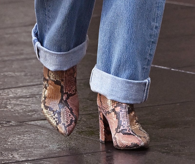 Anne Hathaway adds exotic glamour to her casual fit with Zadig & Voltaire Glimmer Wild ankle boots