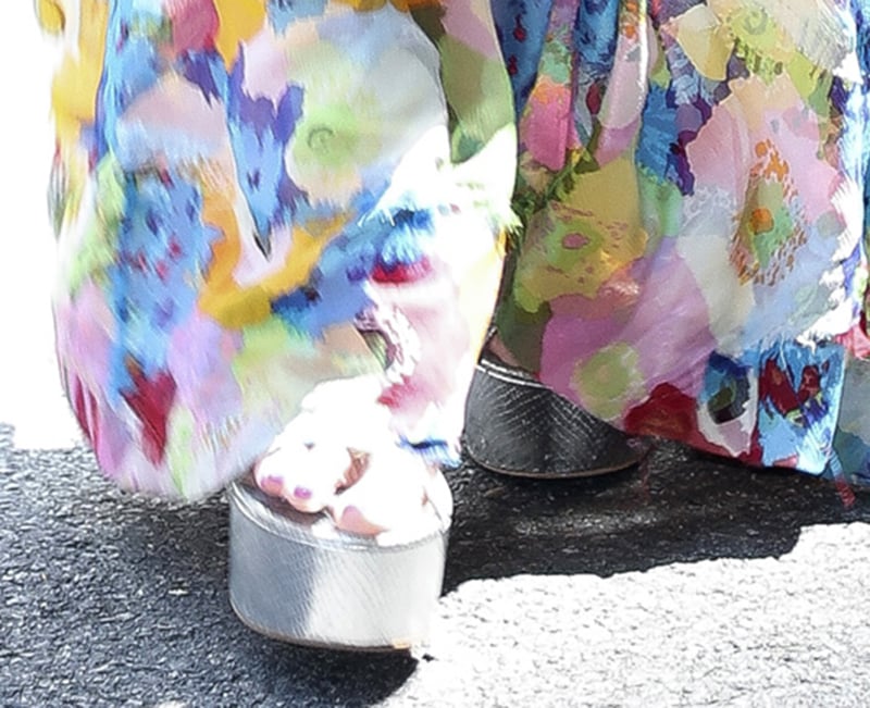 Jessica Simpson completes her chic floral summer look with silver Aamina sandals