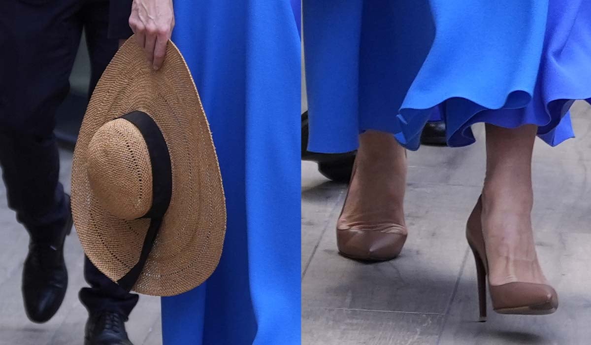 Kate Middleton holds a natural straw floppy hat by L.K. Bennett and completes her elegant summer look with brown Ralph Lauren pumps