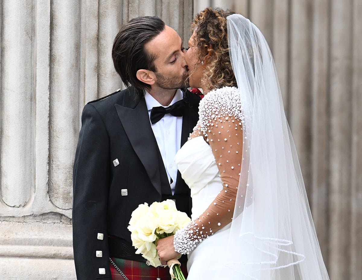 Rory McPhee and Mel B share a kiss after their wedding ceremony at St. Paul's Cathedral in London