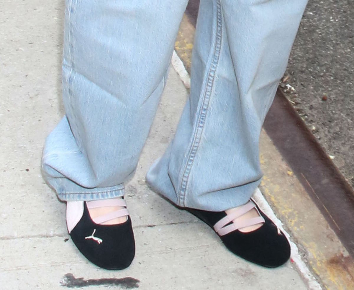 Julia Garner teams her laid-back cool ensemble with Puma's Speedcat Ballet shoes