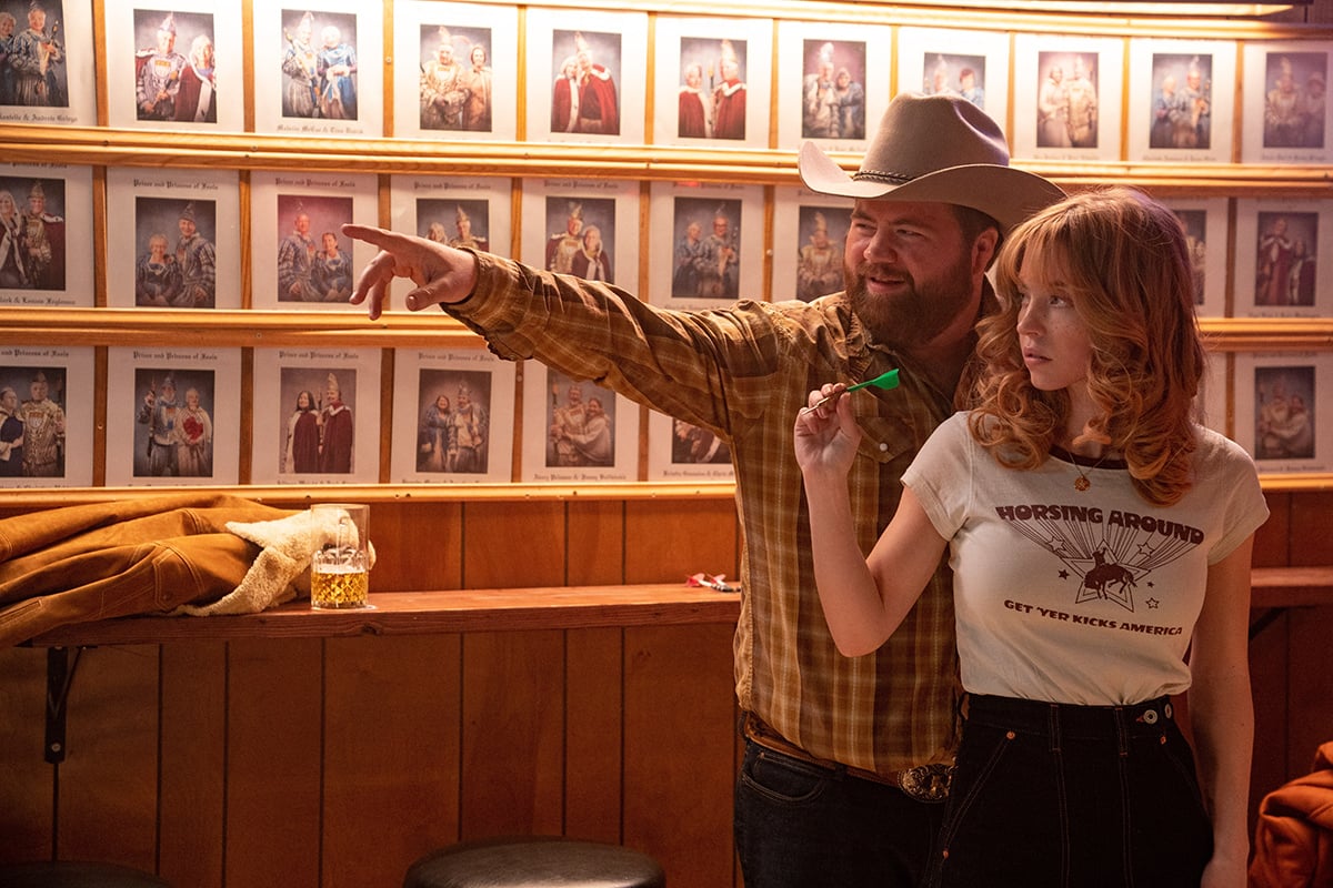Paul Walter Hauser and Sydney Sweeney star in the crime thriller Americana