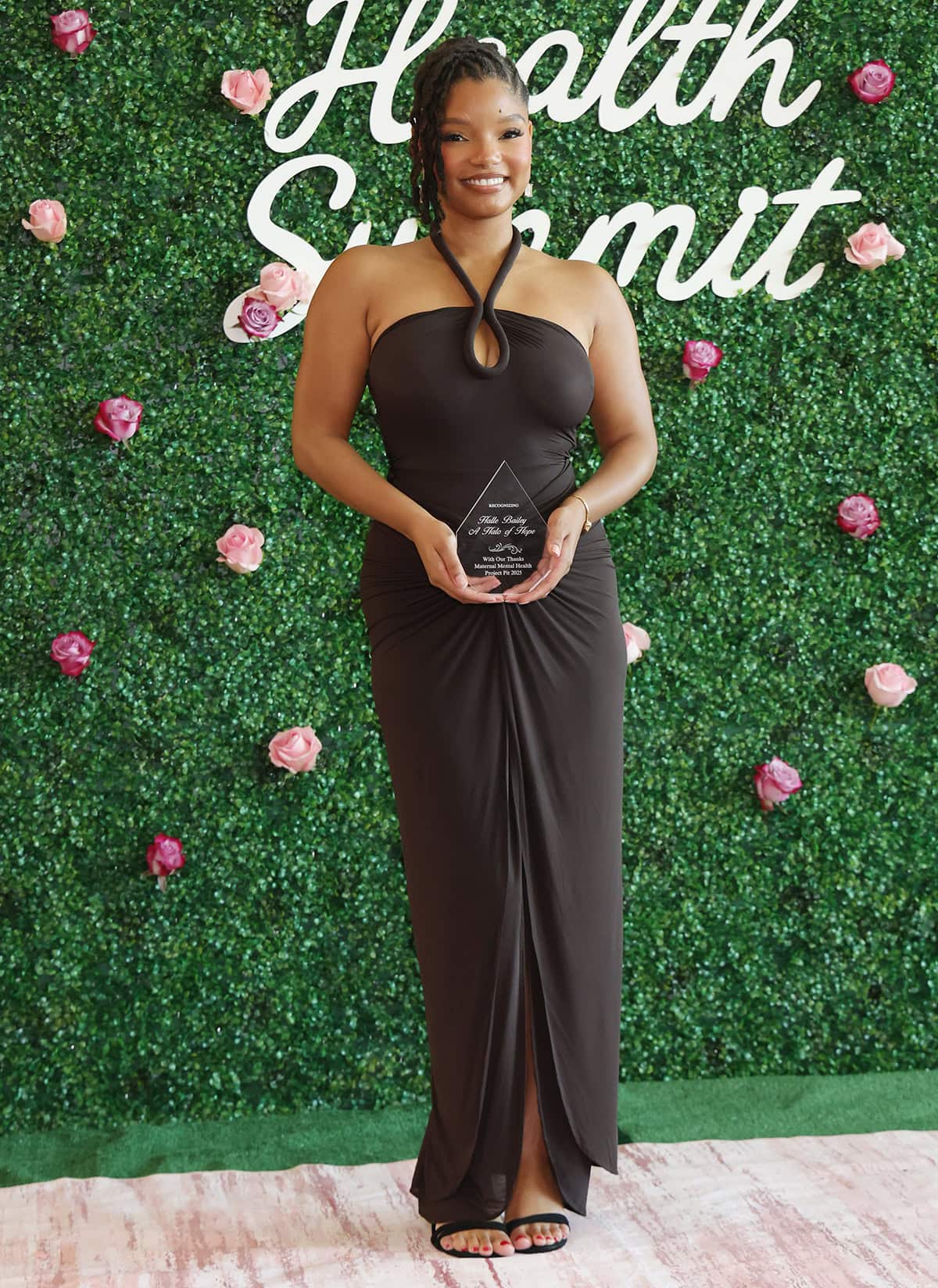 Halle Bailey is honored at Project Pit's Maternal Health Summit for her openness and advocacy towards maternal health and her postpartum journey