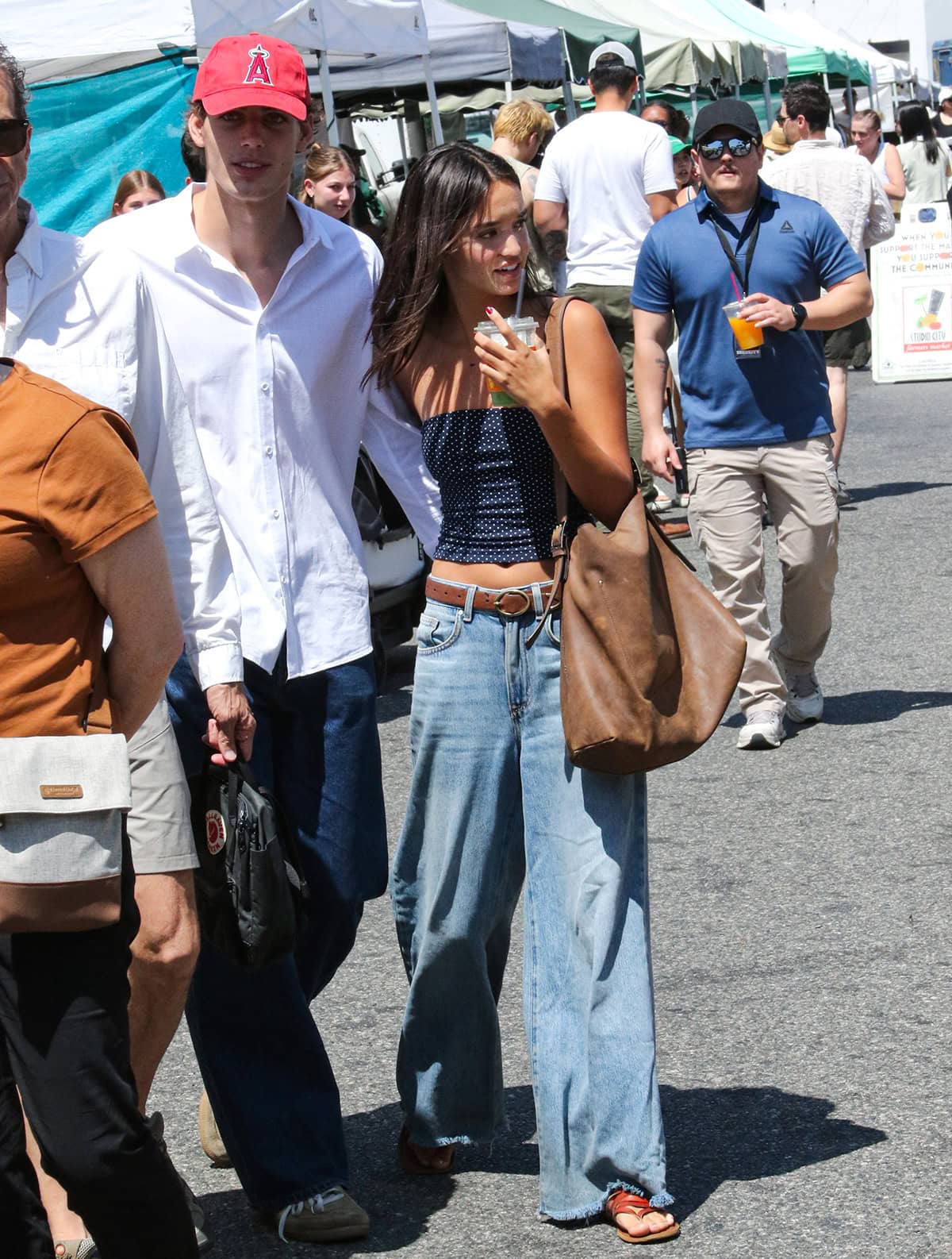 Sophia Hammons steps out on a date wearing a chic, laid-back summer ensemble at Studio City Farmers Market on August 17, 2025, in Los Angeles, California