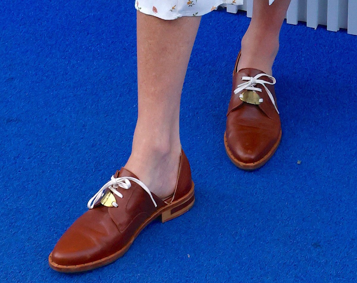 Elizabeth Banks pairs her feminine floral dress with edgy brown D'Orsay oxfords by Freda Salvador x Ariel Gordon