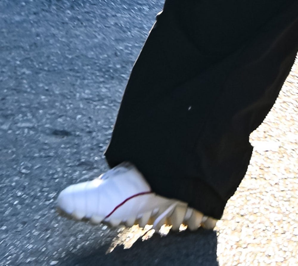 Rihanna grounds her playful balletcore-inspired look with rare Puma by Jil Sander 2002 spike sneakers, blending high-fashion whimsy with archival streetwear edge