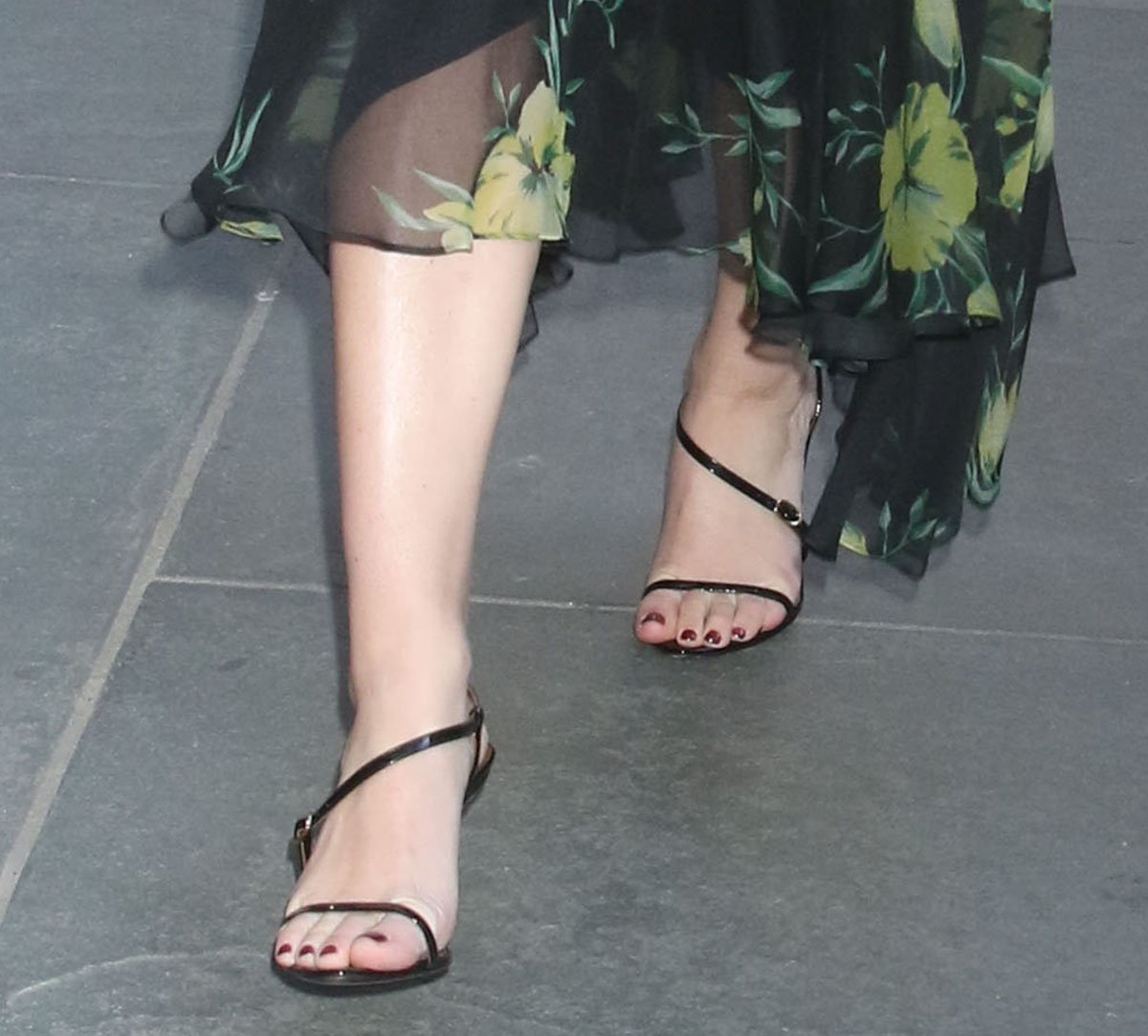 Lili Reinhart completes her feminine look with the dainty Giuseppe Zanotti "Audrinette" sandals featuring thin straps and stiletto heels