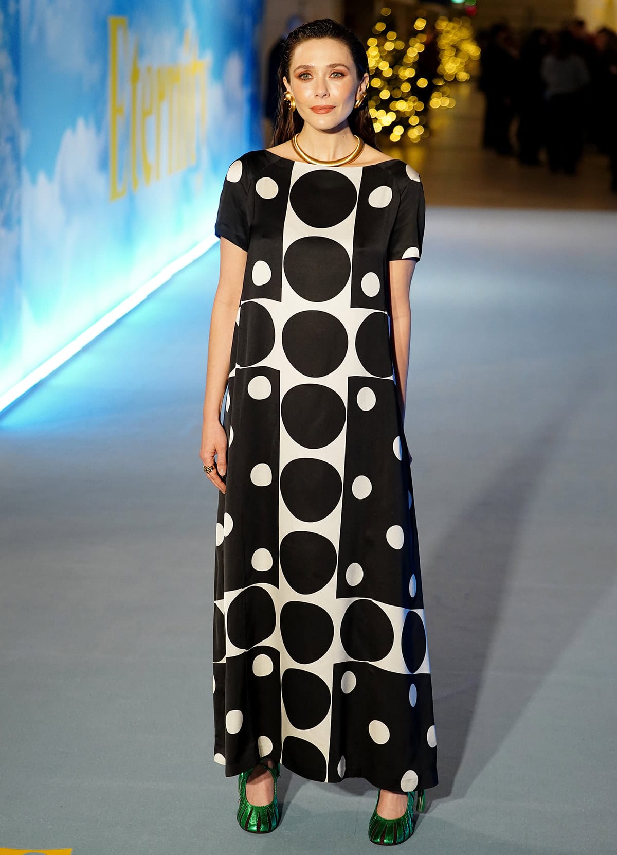 Elizabeth Olsen goes the modern route in a shapeless black-and-white geometric dress by Dries Van Noten