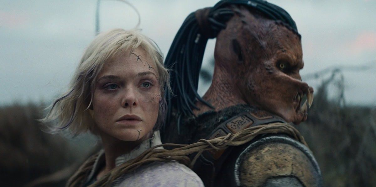 Elle Fanning and Dimitrius Schuster-Koloamatangi star in the sci-fi film Predator: Badlands