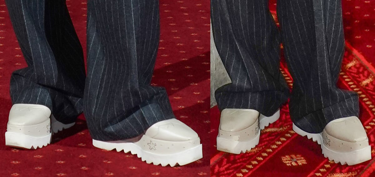 Cate Blanchett wears the bold and quirky Stella McCartney "Elyse" platform shoes in nude-beige vegan leather with studded midsoles and serrated outsoles