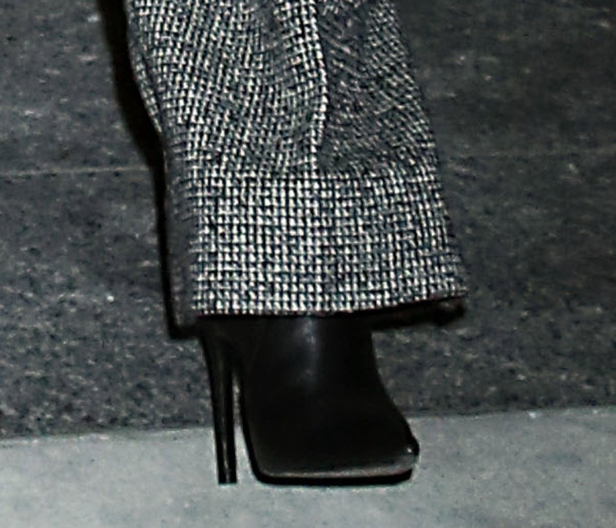 Kate Hudson adds polish to her cozy winter look with black leather boots featuring pointed toes and slim high heels for her Watch What Happens Live With Andy Cohen appearance