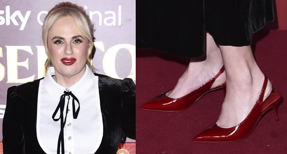 Rebel Wilson Shines in Black Velvet Temperley London Dress and Red Christian Louboutin Slingbacks at the Tinsel Town London Premiere