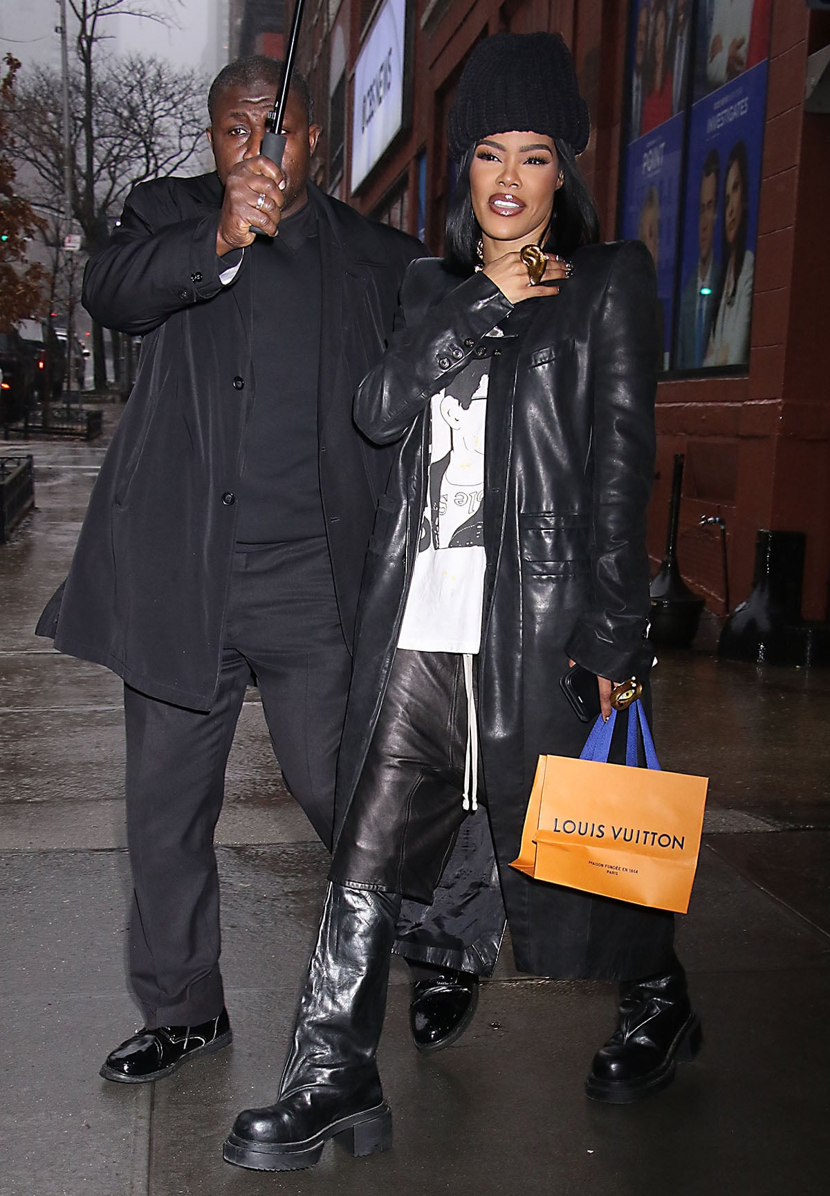 Teyana Taylor grounds her edgy leather streetwear look with chunky Rick Owens platform boots as she arrives at the CBS Mornings studio in New York City on December 19, 2025