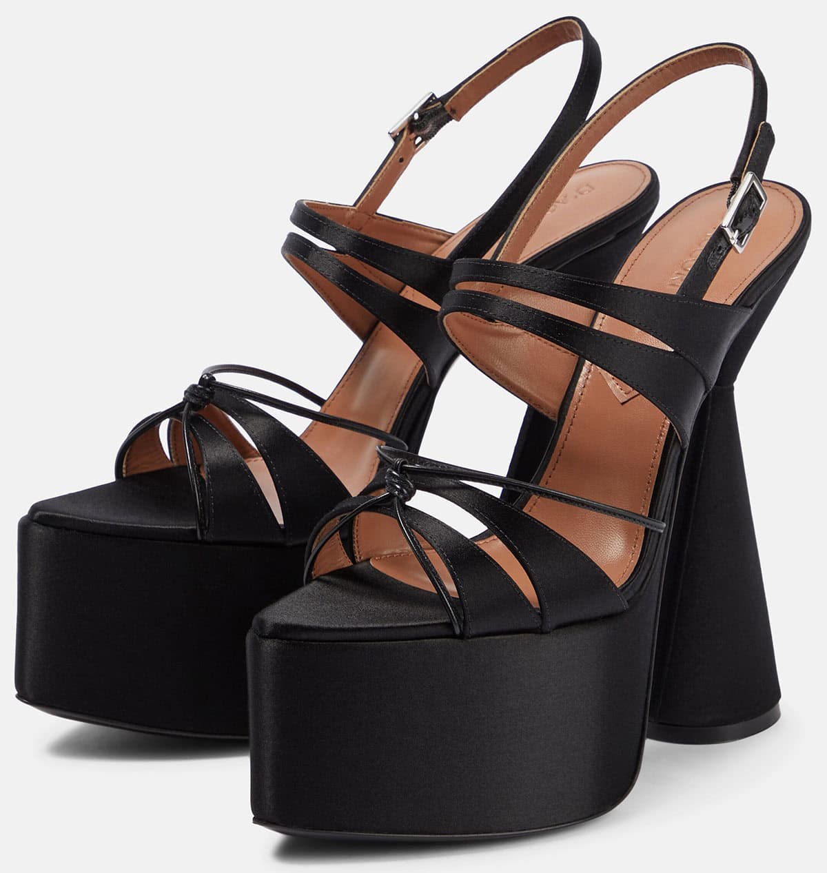 D’Accori “Belle” satin platform sandals with a towering 7-inch (17.5 cm) block heel and a 3-inch (7 cm) platform make a bold statement in black satin, combining crossover straps and a slingback silhouette for maximum height and stability