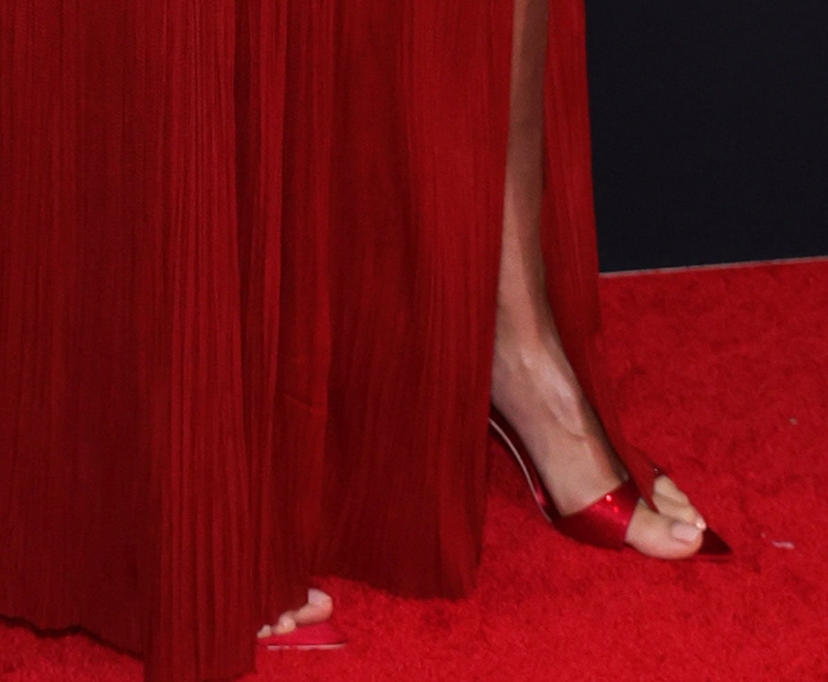 Heidi Klum goes red-hot in a pair of red pointed open-toe mules