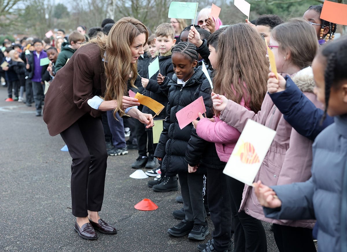 Kate Middleton opts for practical elegance in brown tailoring, finishing her Children’s Mental Health Week visit with polished penny loafers ideal for a hands-on school engagement