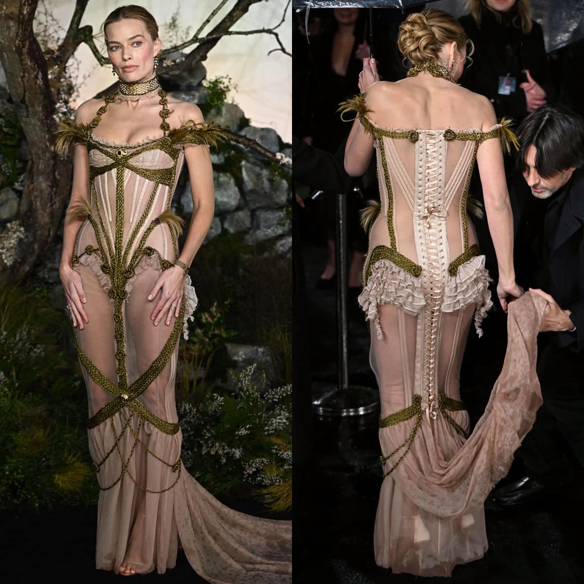 Margot Robbie commands attention in a sheer nude Dilara Findikoglu gown featuring a corseted bodice, corset lacing at the back, lace ruffles, green-gold braided rope trims, feathers, and a dramatic train