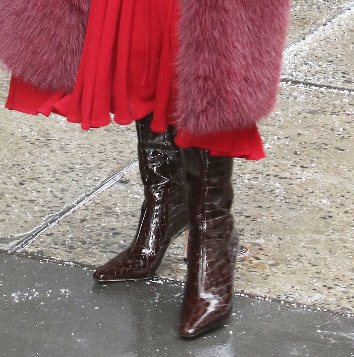 Priyanka Chopra slips into the burgundy Jimmy Choo “Agathe” croc-embossed boots