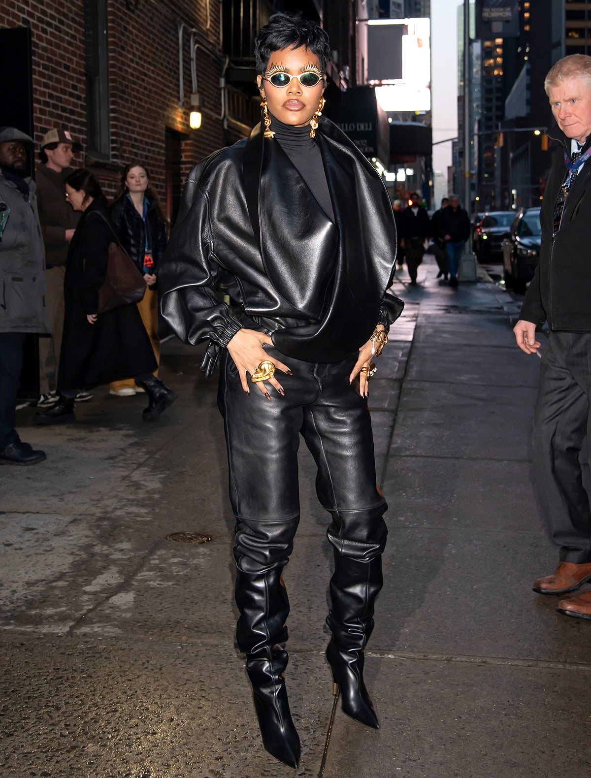 Teyana Taylor steps out in New York City on February 25, 2026, wearing sculptural Khaite “Bella” knee-high boots styled with a sleek all-black leather ensemble by Phoebe Philo before her appearance on The Late Show with Stephen Colbert