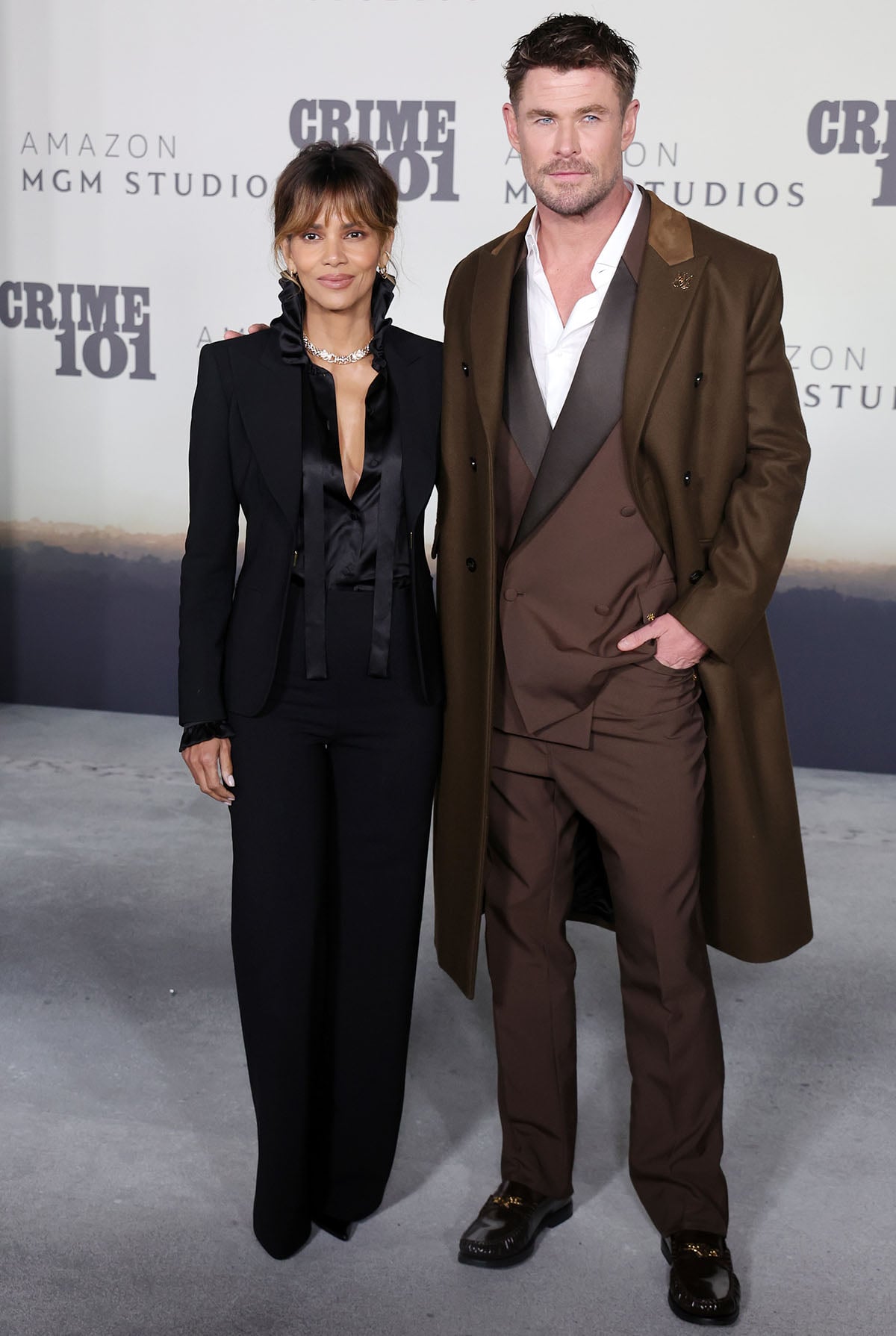 Halle Berry and Chris Hemsworth at the world premiere of Amazon MGM Studios Crime 101 in Los Angeles