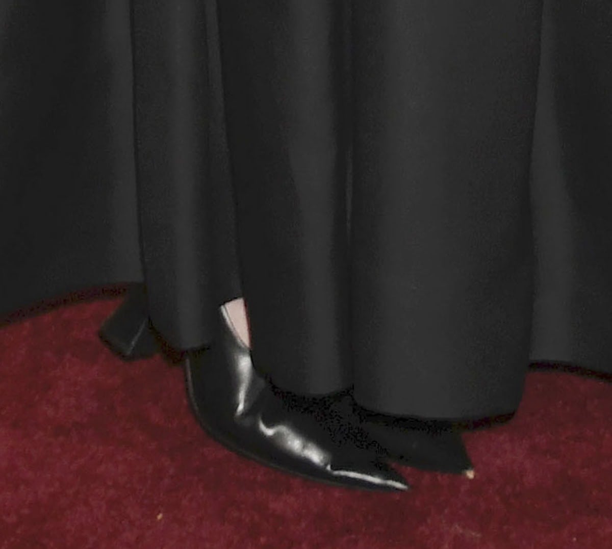 Kirsten Dunst adds edge to her look with the Khaite “Colleen” pumps featuring high-cut uppers, pointed toes, and flared block heels