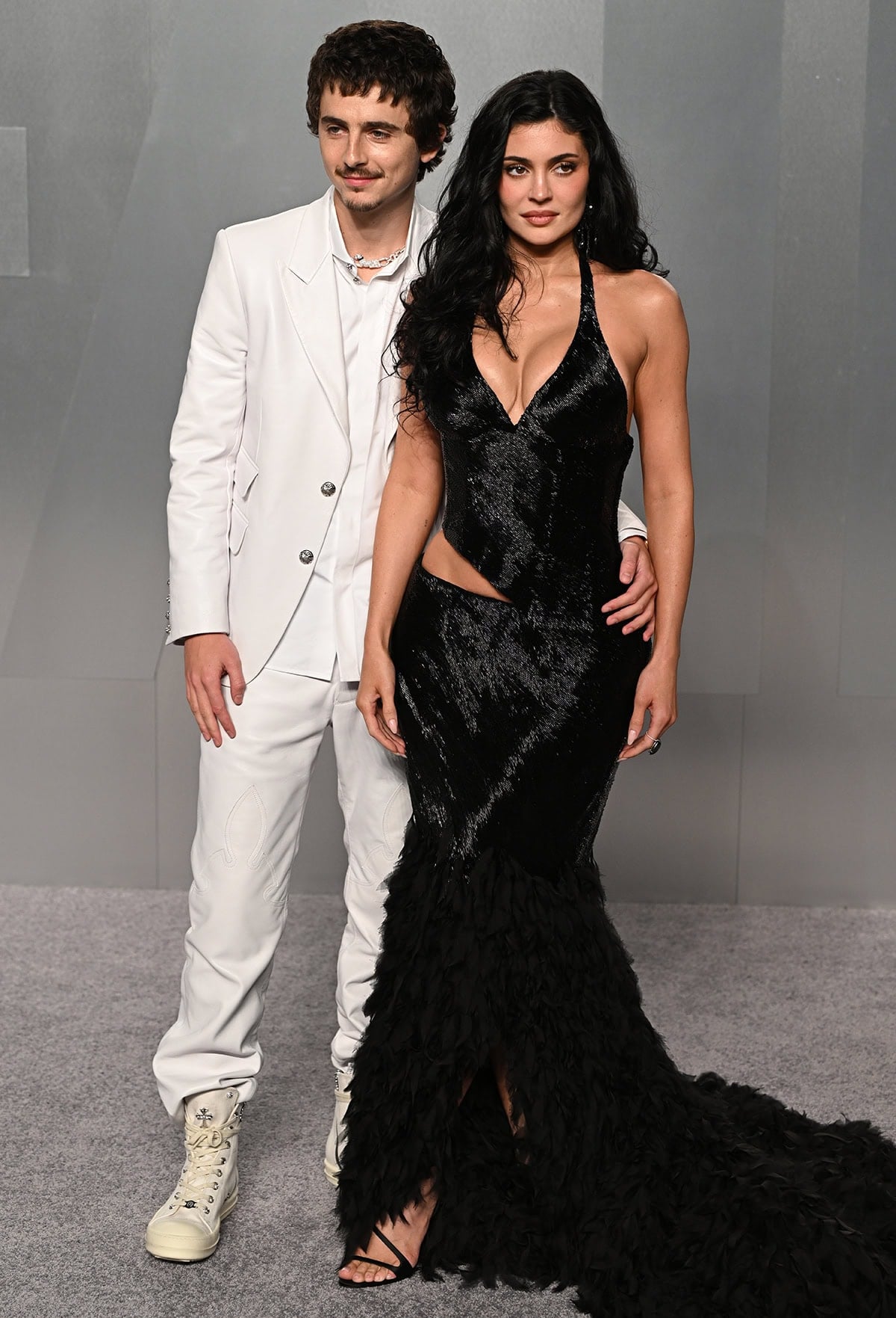 Kylie Jenner steals the spotlight from her boyfriend, Timothée Chalamet, at the Vanity Fair Oscars after-party on March 15, 2026, arriving in a dramatic black Alexander McQueen gown paired with strappy heels