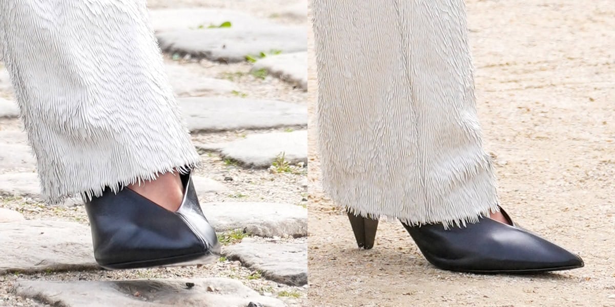 Sarah Pidgeon wears a pair of black Loewe V-neck glove-style pointy pumps with cone-shaped heels