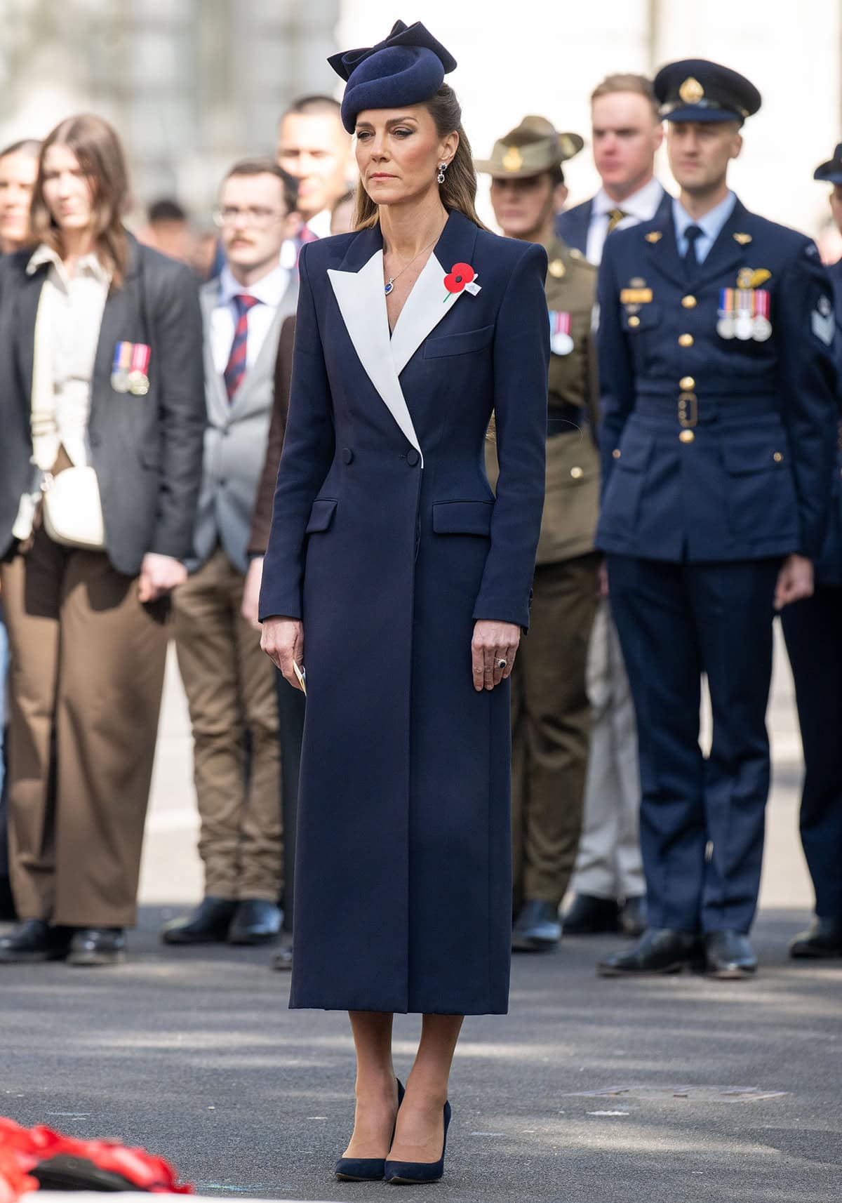 Kate Middleton looks sophisticated in a head-to-toe navy at the ANZAC Day service of commemoration and thanksgiving at Westminster Abbey, London