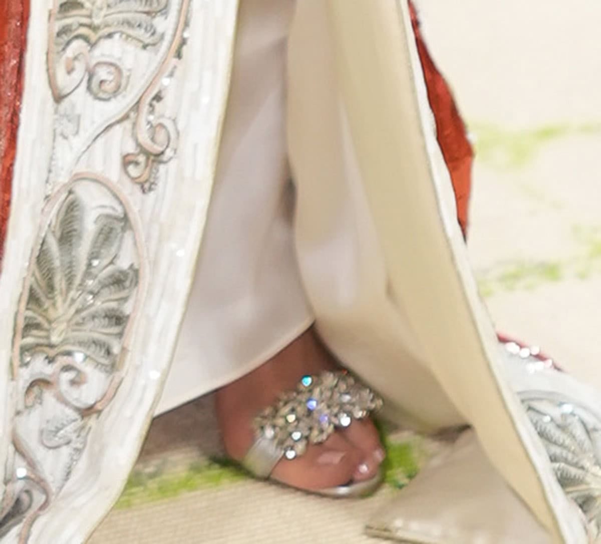 Kris Jenner elevates her kimono dress with silver crystal-encrusted Manolo Blahnik sandals