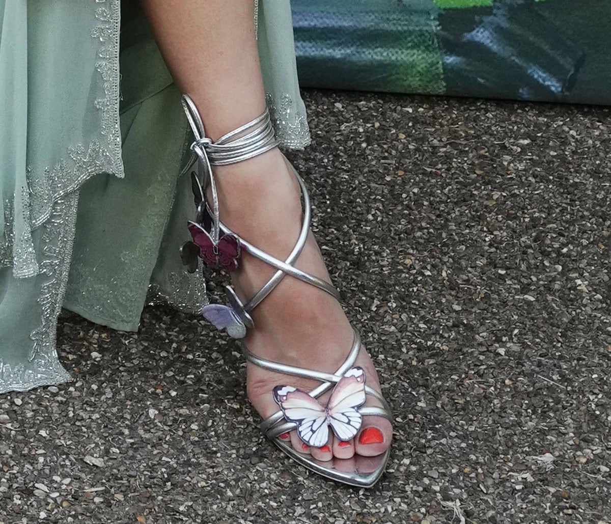 Pixie Lott goes whimsical with her Sophia Webster “Vanessa” sandals featuring a strappy upper with 3D butterfly appliques