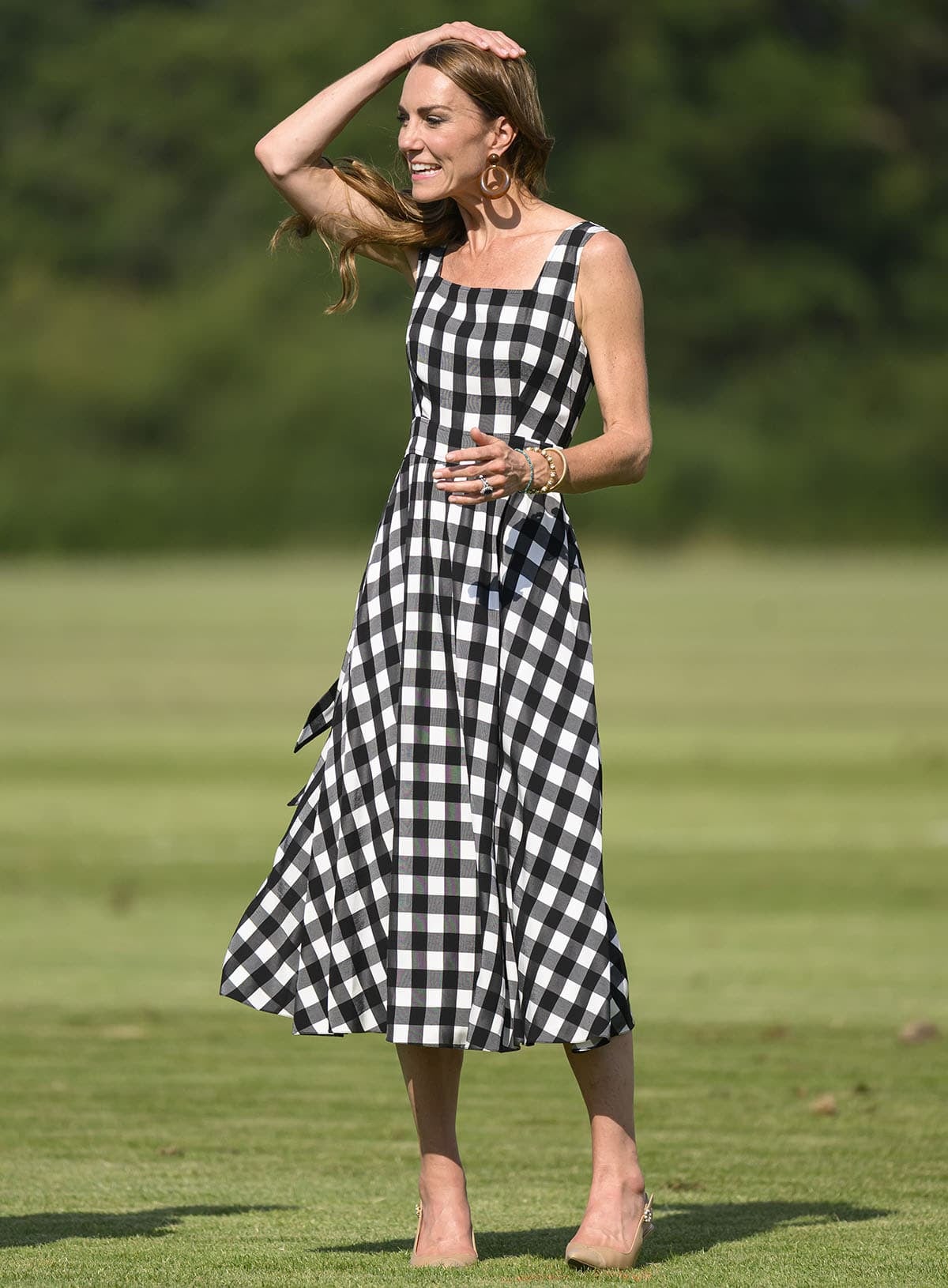 Kate Middleton teams her slingbacks with a summery black-and-white gingham midi dress by Temperley London for the DMMI Royal Charity Polo Cup at Guards Polo Club Windsor